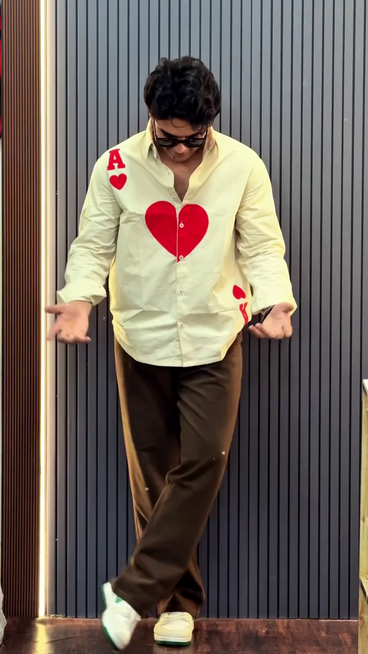 🃏 Statement Cream Heart Graphic Button-Down Shirt Paired With Brown Relaxed Trousers for Bold Modern Street Style