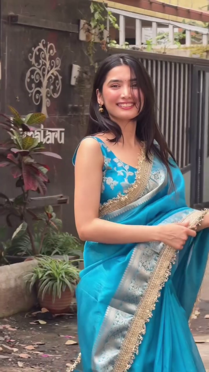 Elegant Teal Blue Saree with Golden Border - Image 2